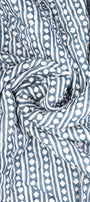 Close-up of blue and white printed ac quilt