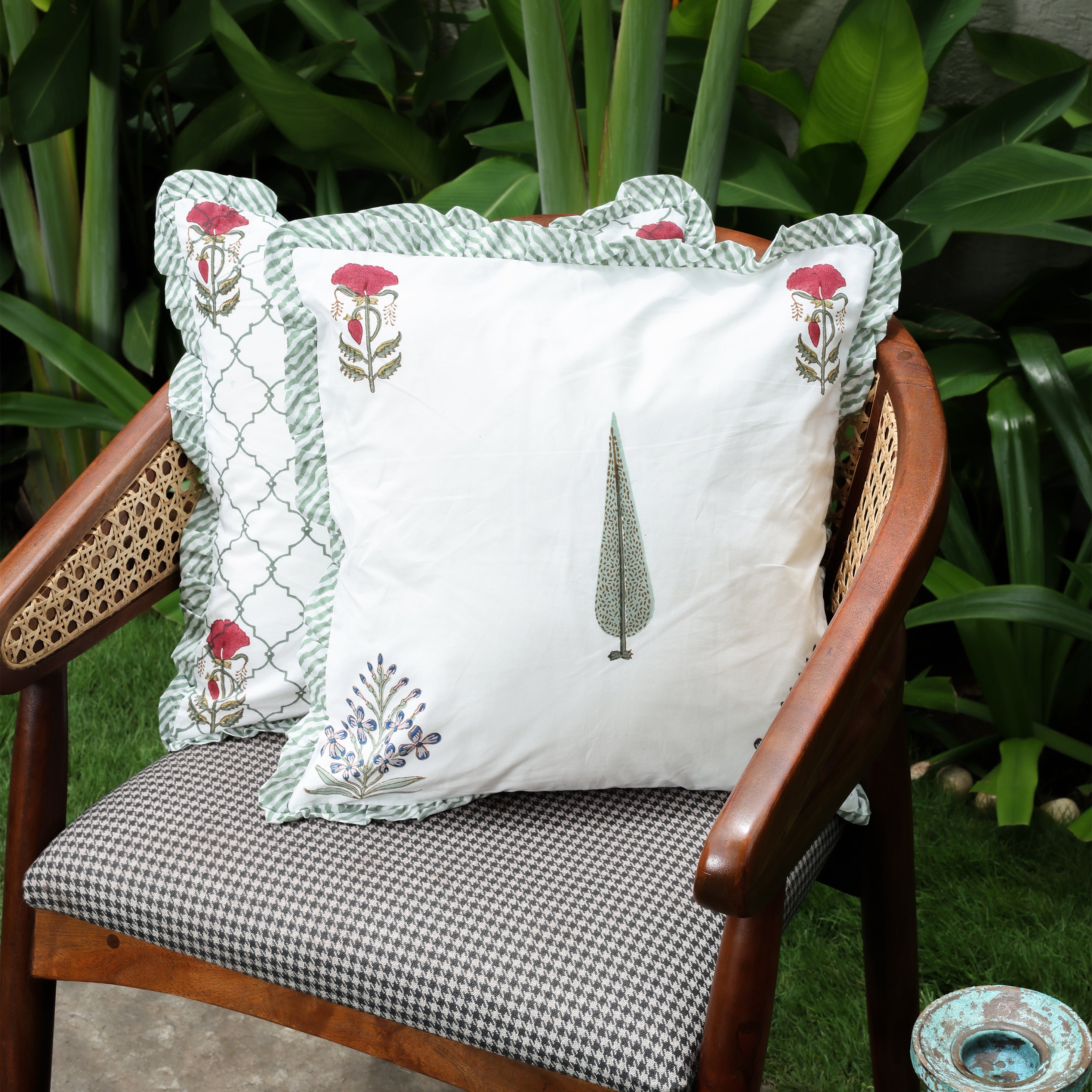 Two cushion covers sitting on a chair. Cushion covers online. Set of 2.