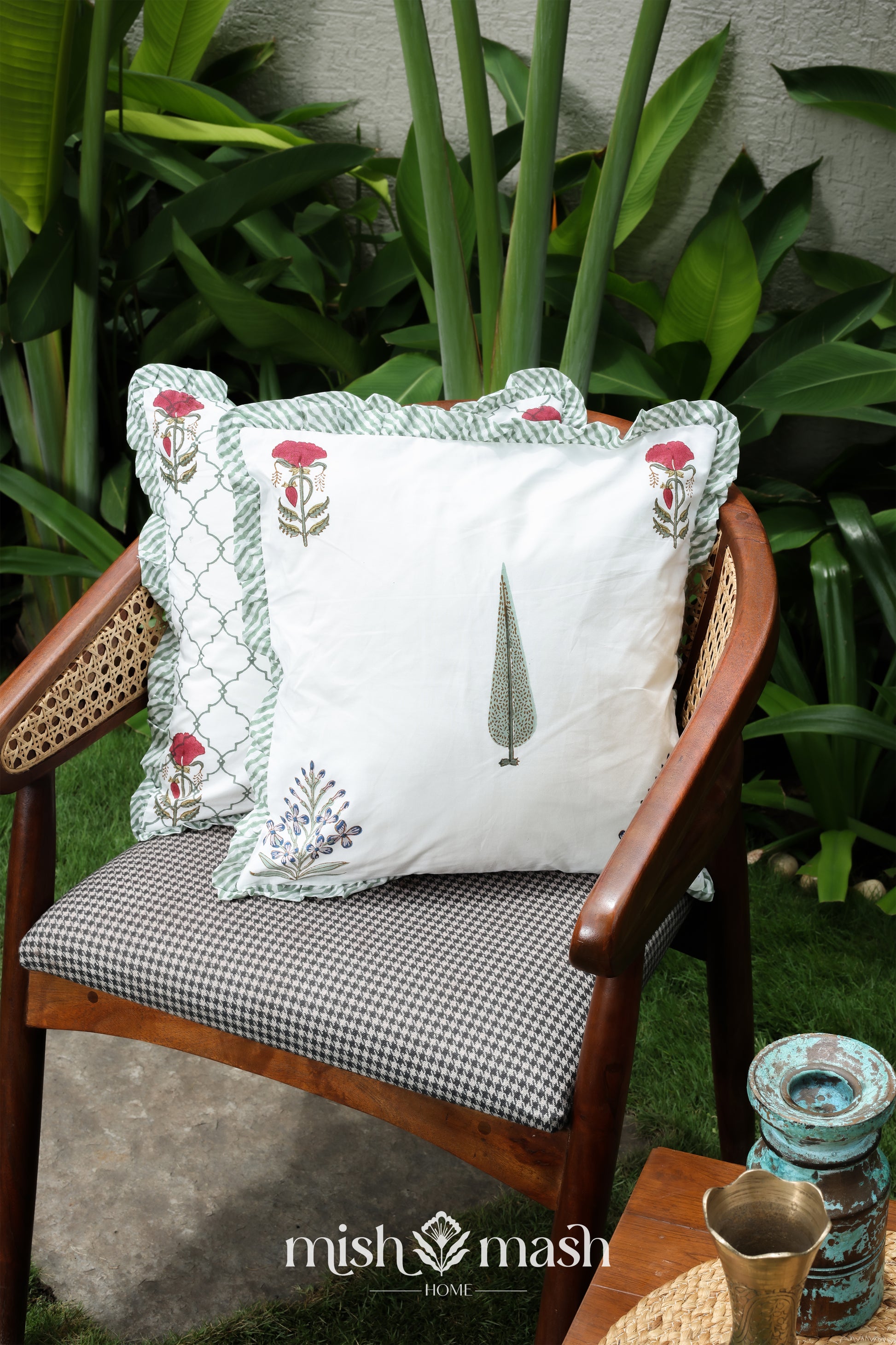Two cushion covers sitting on a chair. Cushion covers online. Set of 2.