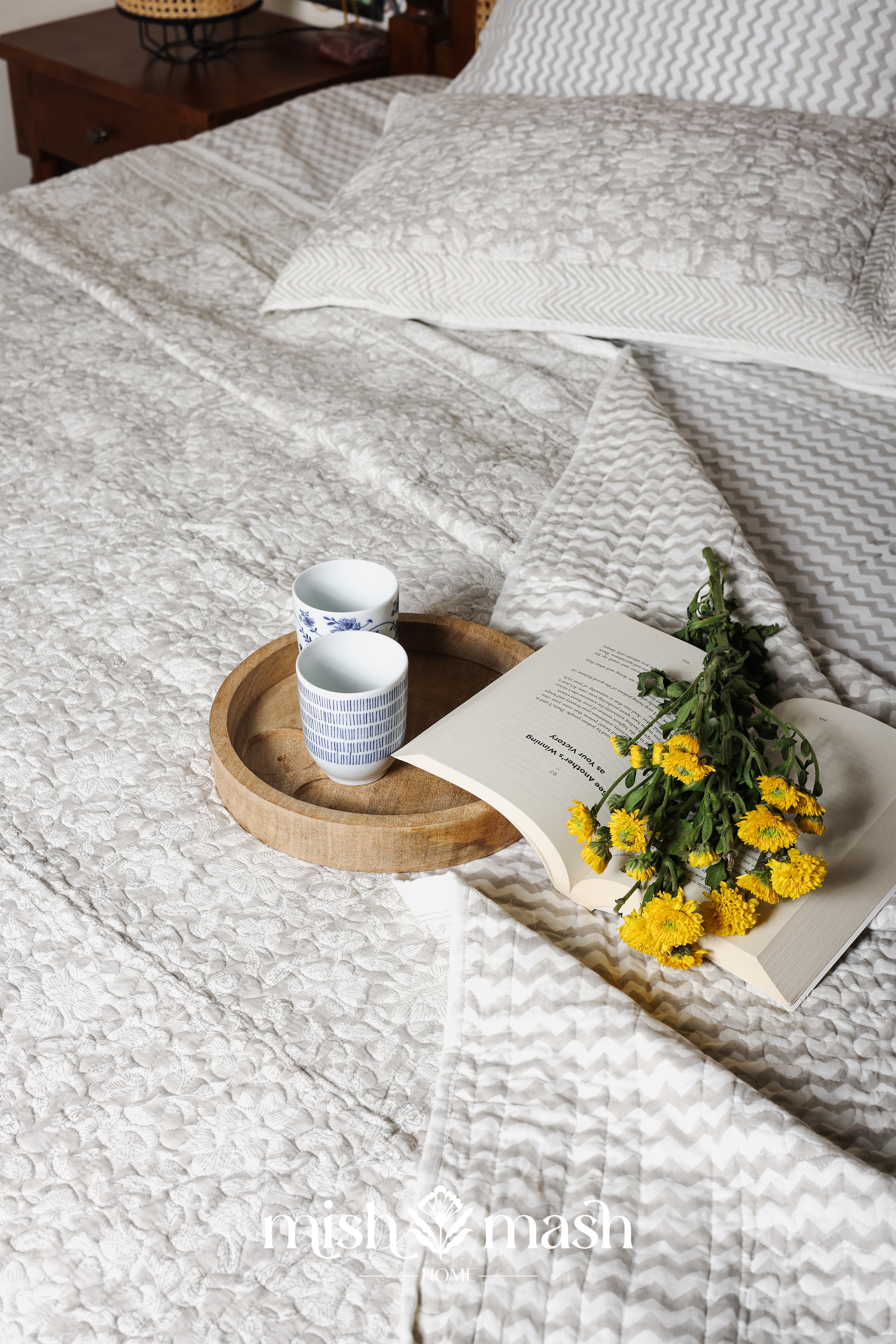 Quilted reversible cotton bed spread online in grey floral and chevron pattern