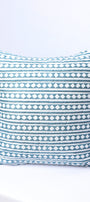 Festive cushion covers online with blue and white geometric pattern on a white background