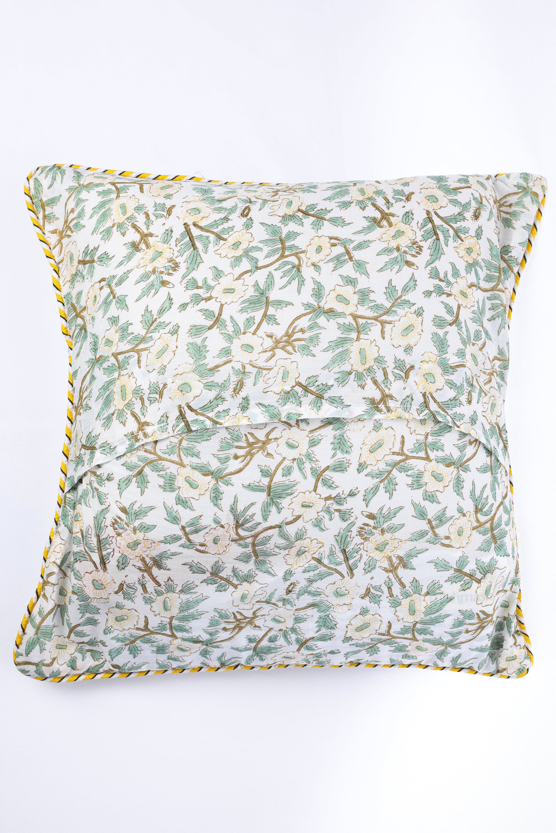 Floral patterned cushion covers online with yellow trim on a white background