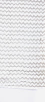 Quilted bed spread in cotton with grey chevron pattern on white background