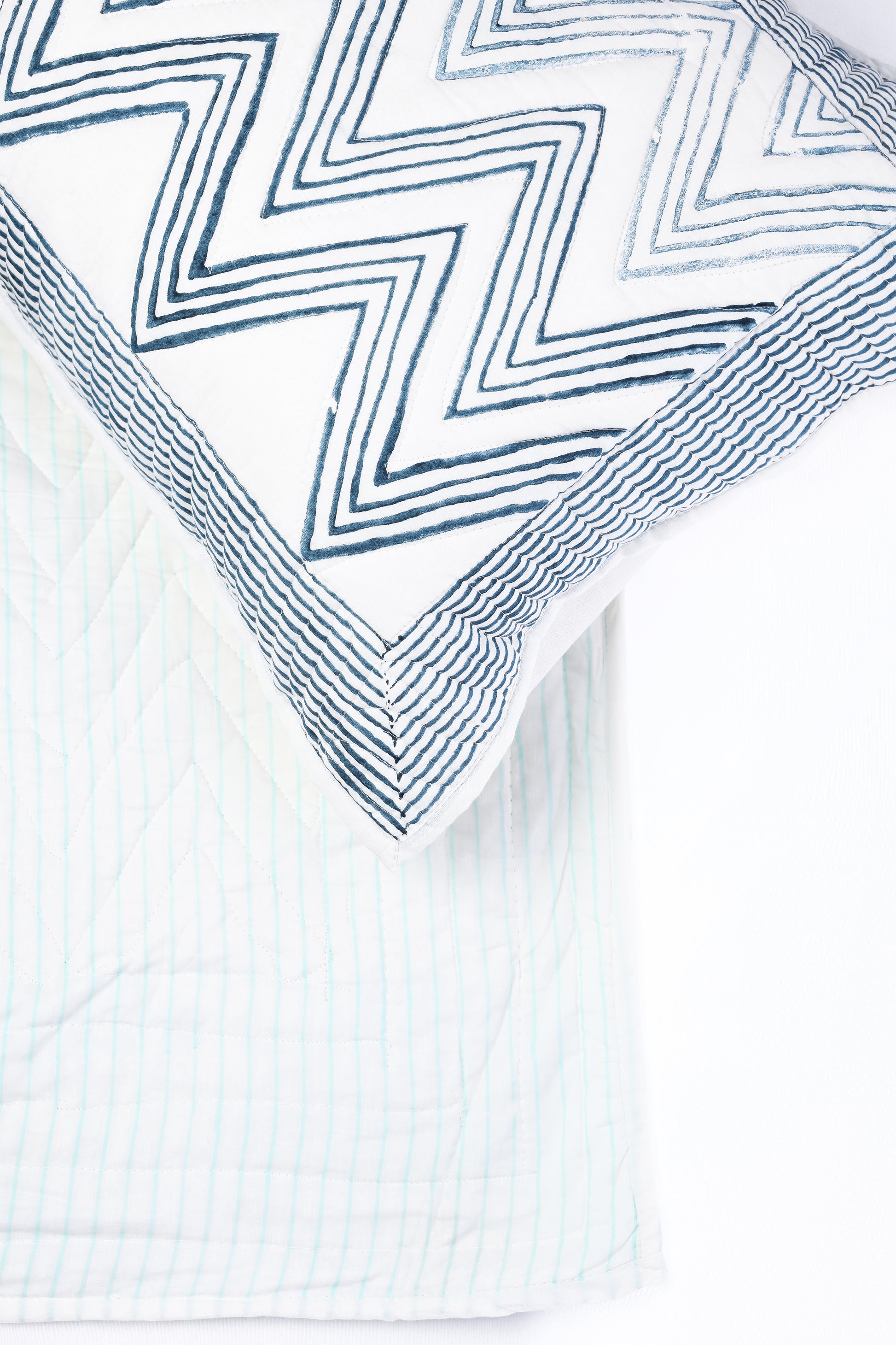 Reversible cotton bed spread with light blue stripes with matching pillow 