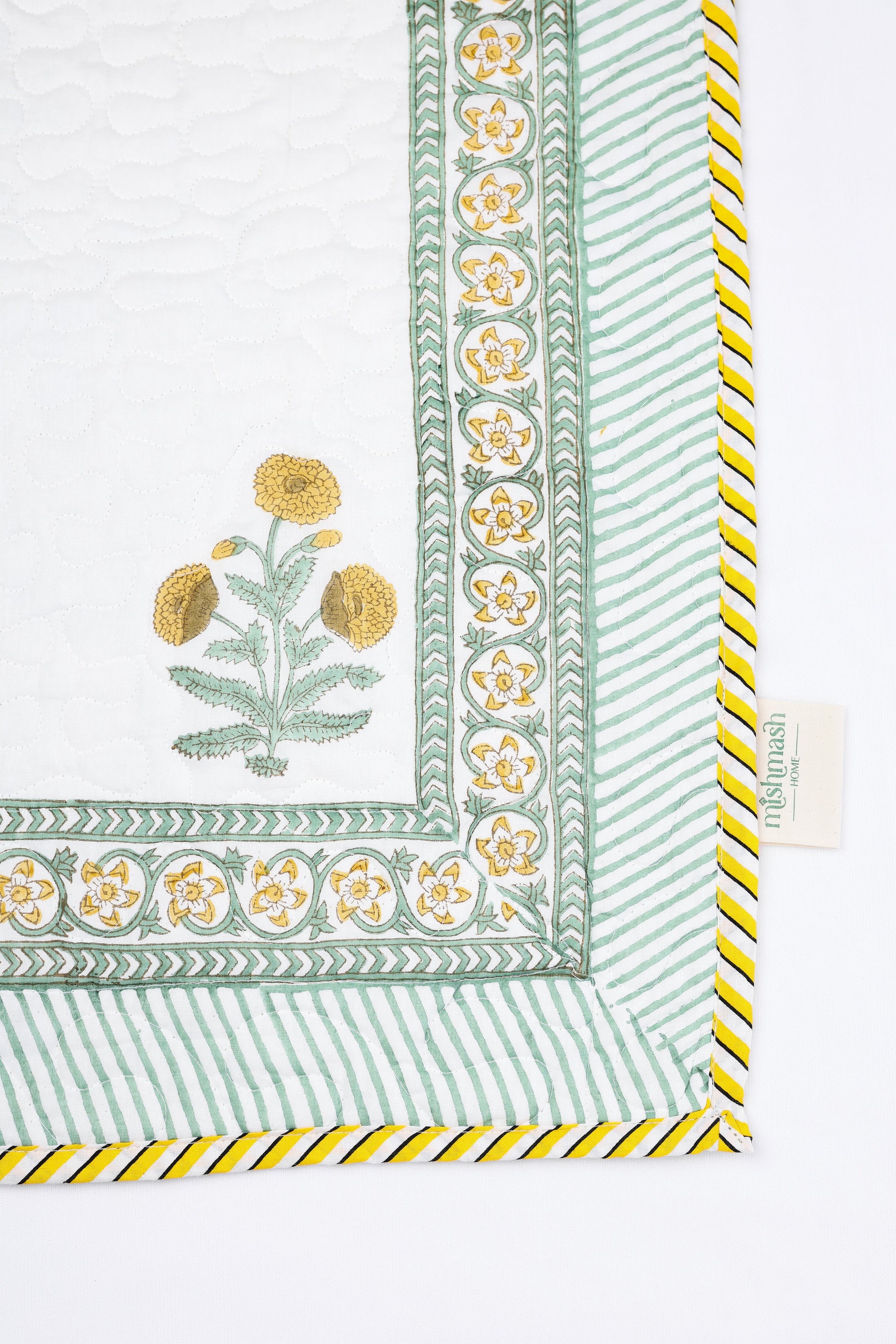 Decorative cotton bed cover with floral pattern and yellow accents. buy bedspreads online