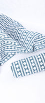 Waffle cotton hand towels with blue and white geometric pattern.