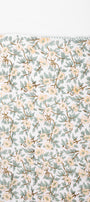 Floral print jaipuri quilt with small yellow flowers and green leaves. Buy quilts and comforter online.