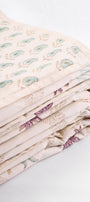 Folded reversible cotton dohar with palm and paisley motifs