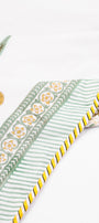 Cotton dohar blanket with yellow floral and striped hand block print on a white background. Buy dohar online. ideal for summers.
