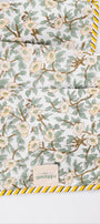 Floral patterned cotton dohar with yellow border on a white background. buy jaipuri dohars online.