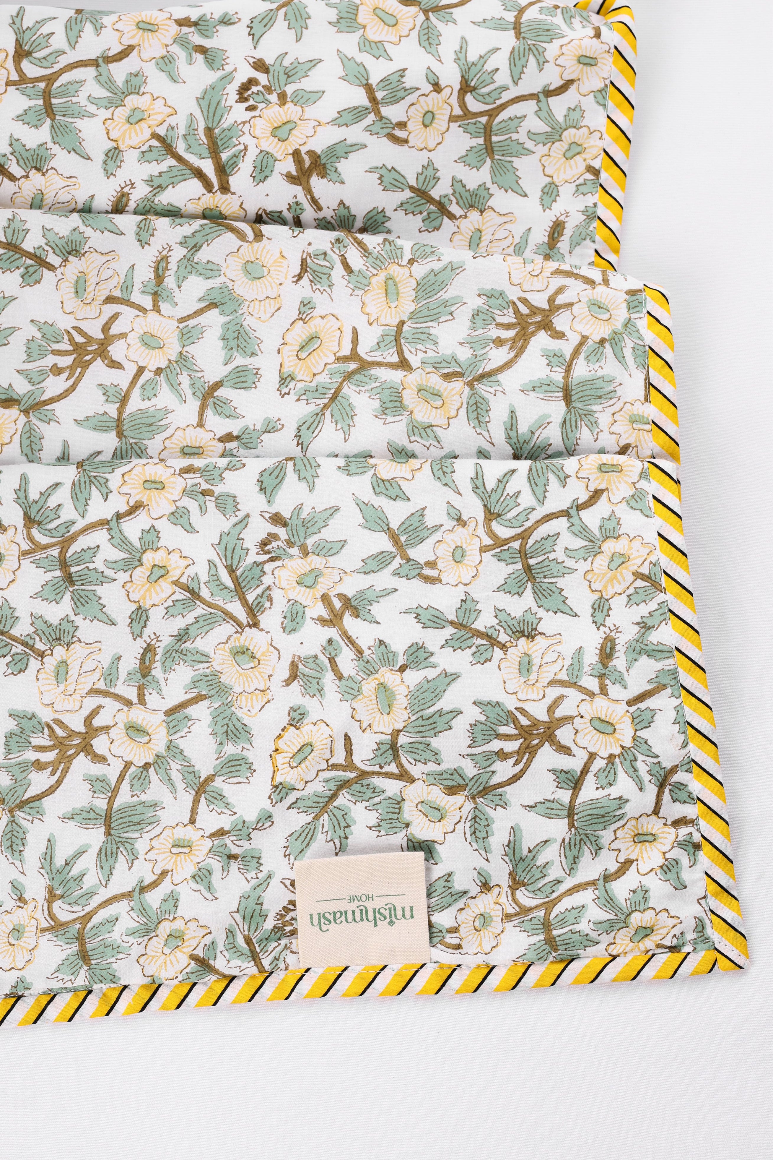 Floral patterned cotton dohar with yellow border on a white background. buy jaipuri dohars online.