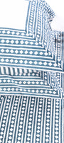 Close-up of a blue and white double bed bedsheet. Buy jaipur bedsheets. bombay dyeing bedsheet.