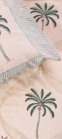 Hand block printed double bedsheet with floral patterns on a beige background