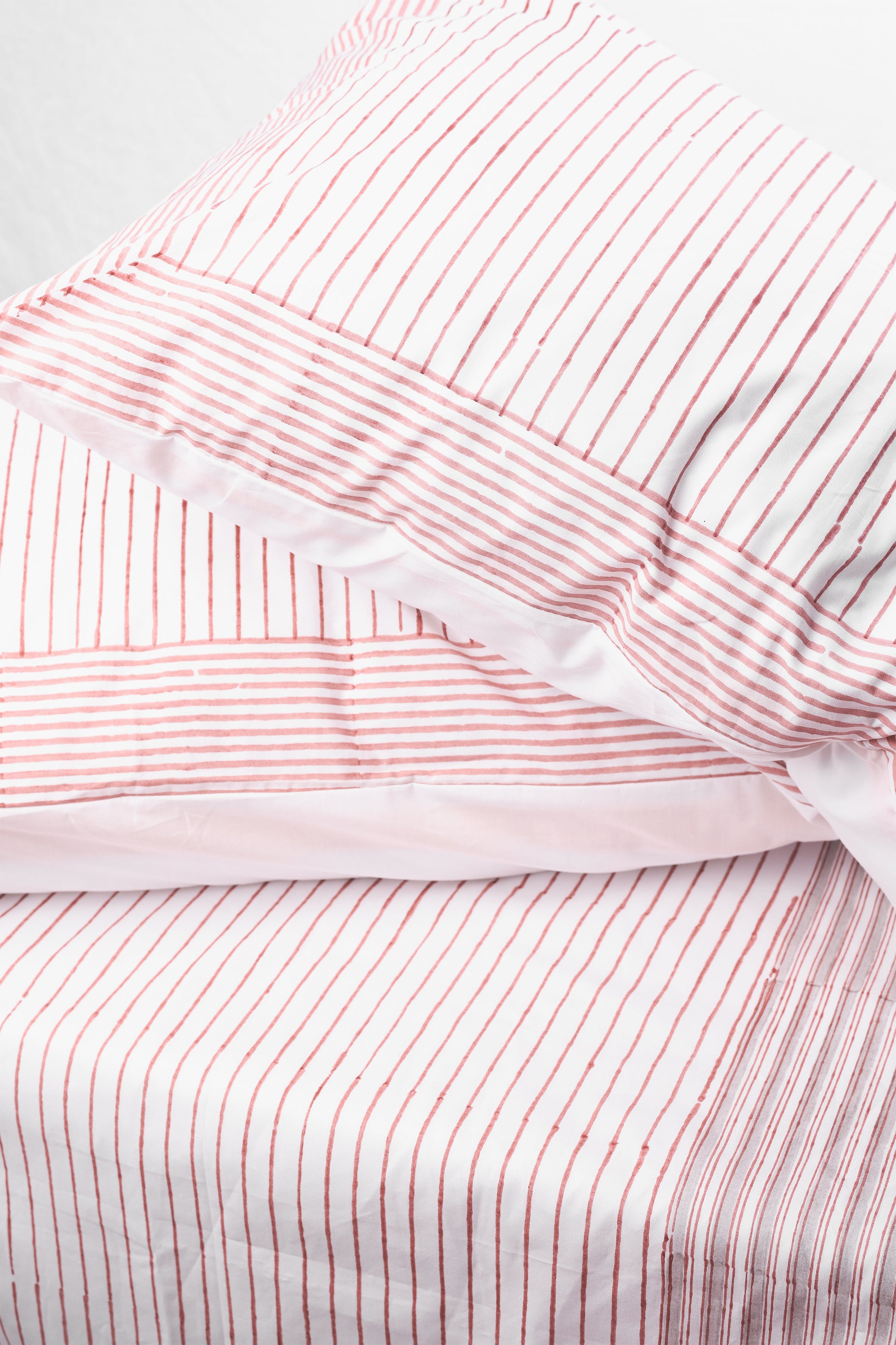 Red and white striped block-printed cotton double bed sheet with matching pillow covers