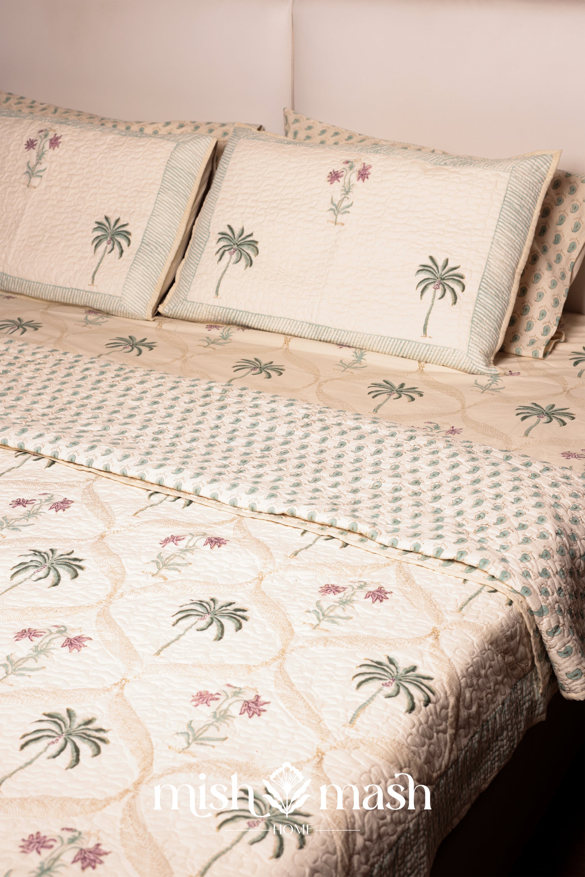 Pure cotton bed sheet with palm tree design and floral motifs with a matching reversible luxury bed spread on top