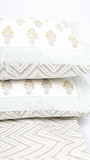 Cotton double bedsheet with green chevrons and reversible pillows