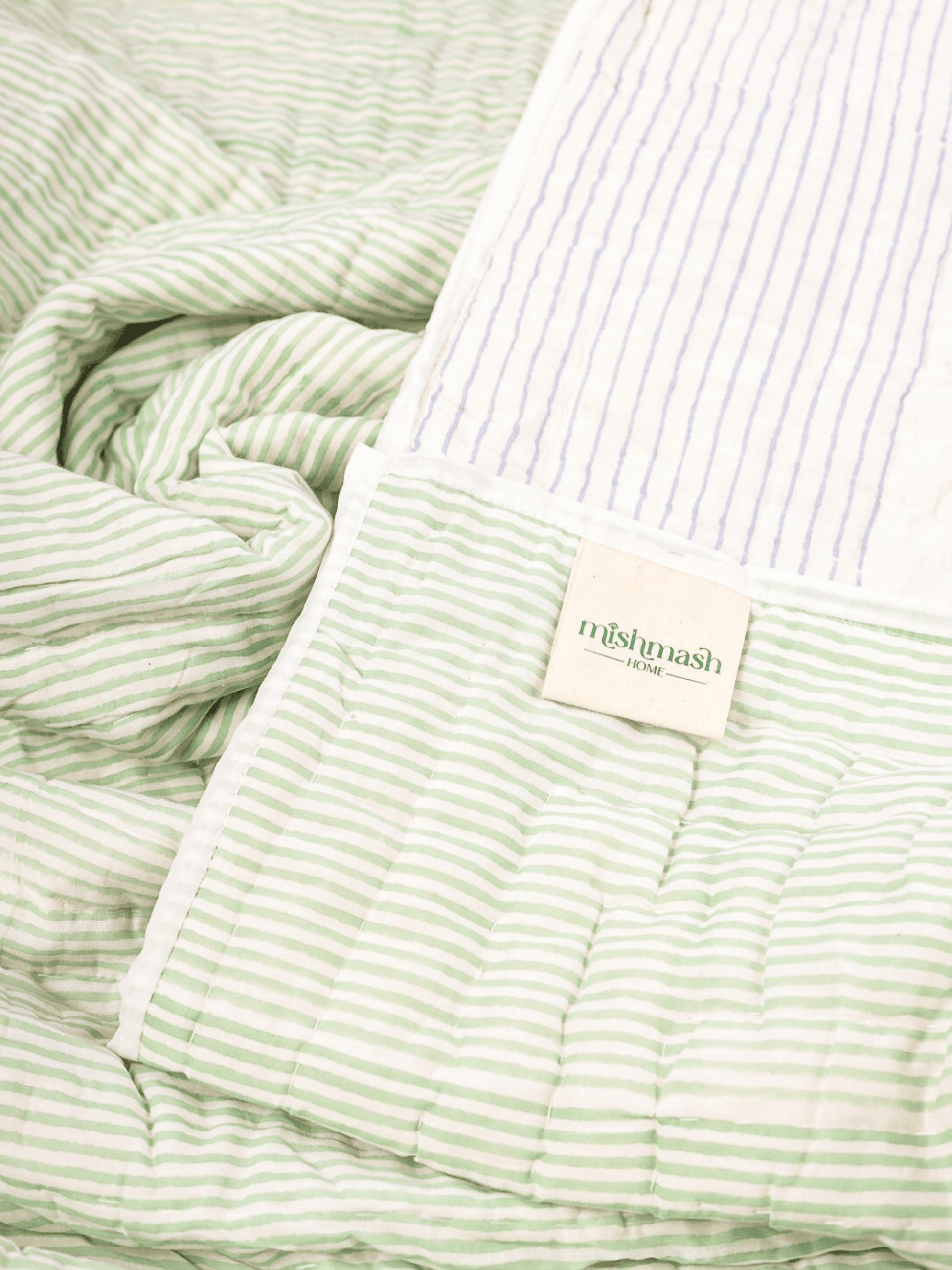 Anar-Kali cotton quilt with green striped reversible side