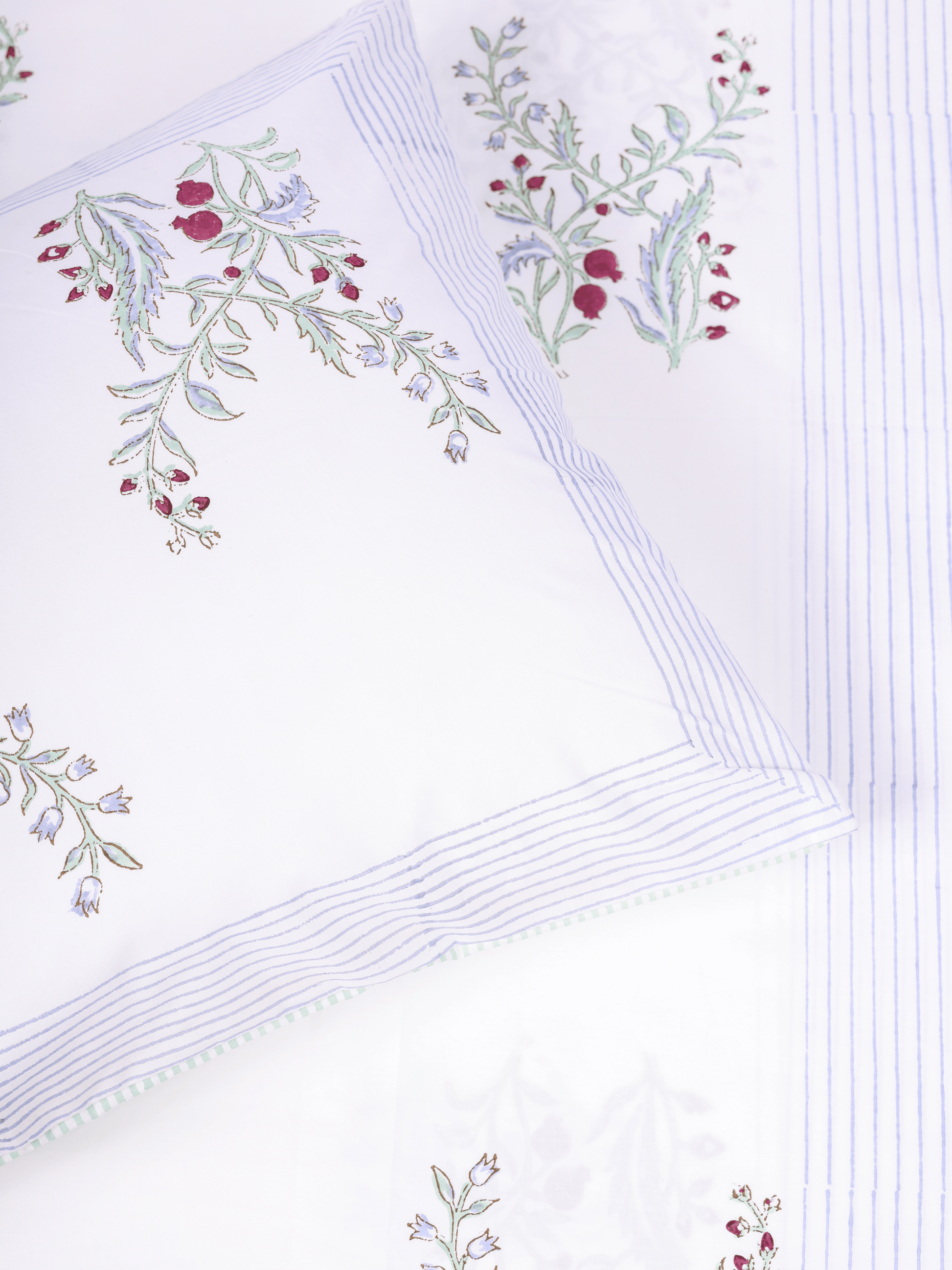 Pure cotton bedsheet in white with green pomegranate print