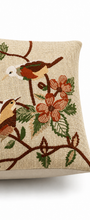 Embroidered cushion cover with bird and branch design