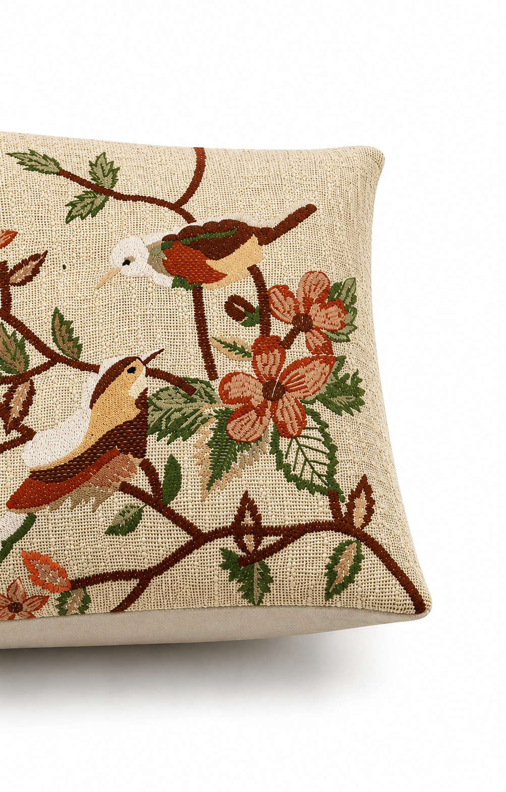 Embroidered cushion cover with bird and branch design
