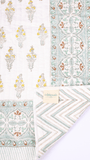 Floral double bed cover with green geometric reverse