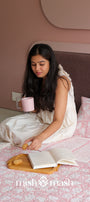 Peach floral and striped double bed cover made from soft cotton