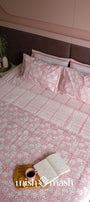 Peach striped double bed bedsheet styled in a bedroom
