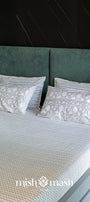 chevron print grey bed sheet in double bed