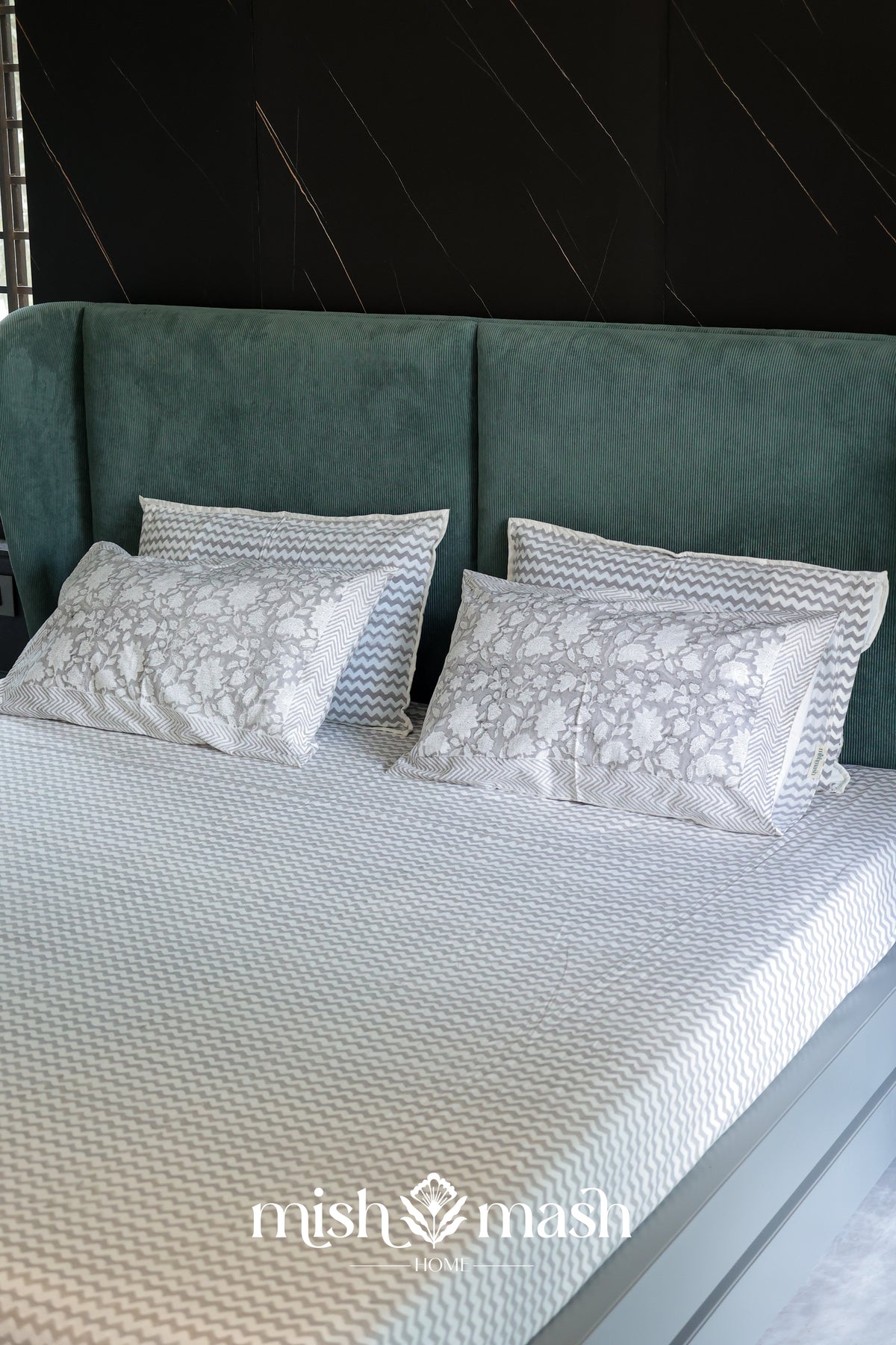 chevron print grey bed sheet in double bed