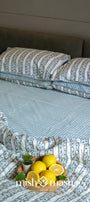 ac quilt on a bed