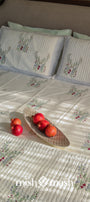 Quilted cotton double bed cover with reversible Anar-Kali design