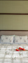 Reversible cotton double bed cover with hand block printed floral motifs
