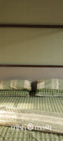 Reversible Jaipuri quilt with olive green stripes on beige background