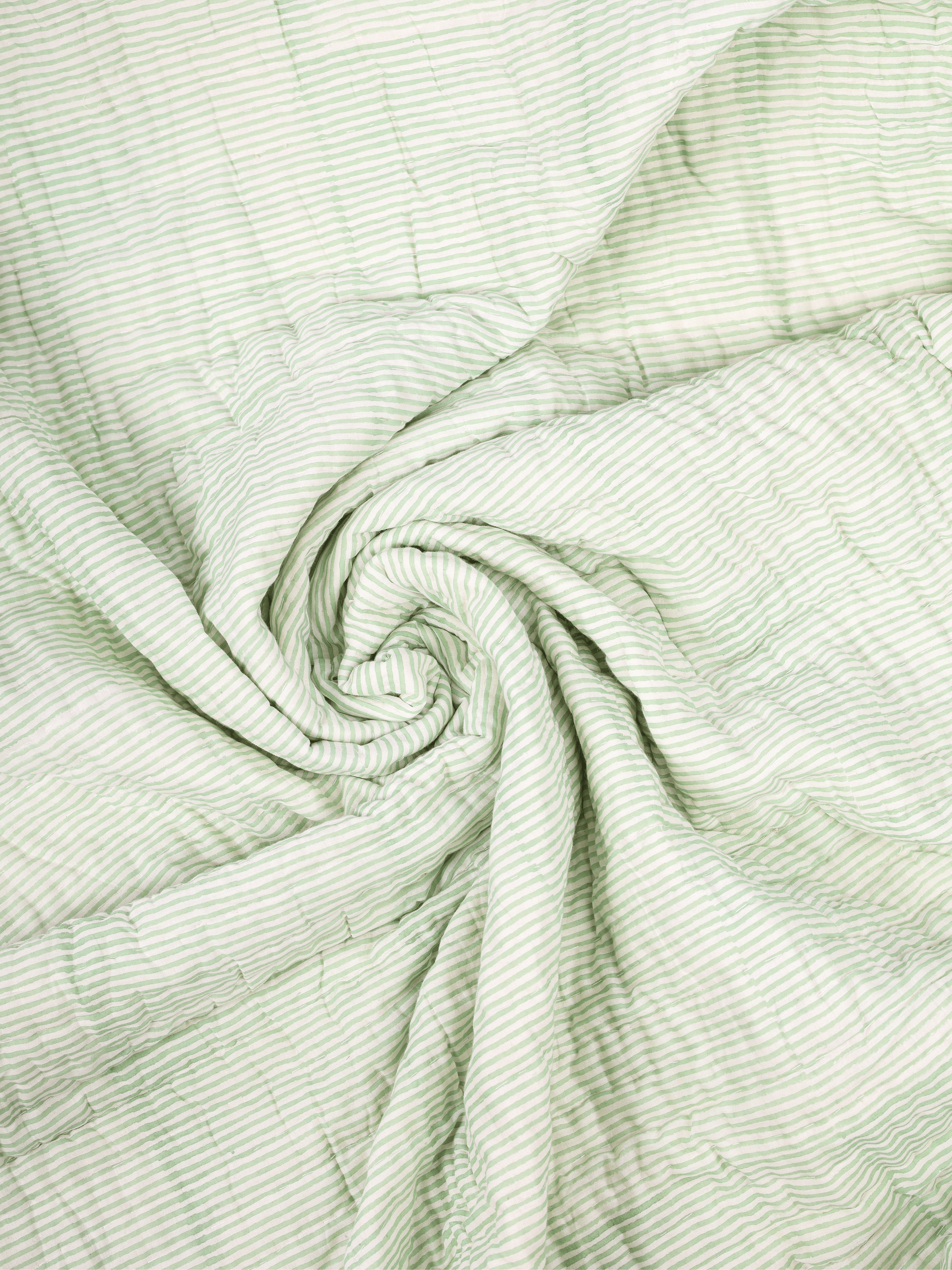 Green and white Jaipuri quilt with cotton filling
