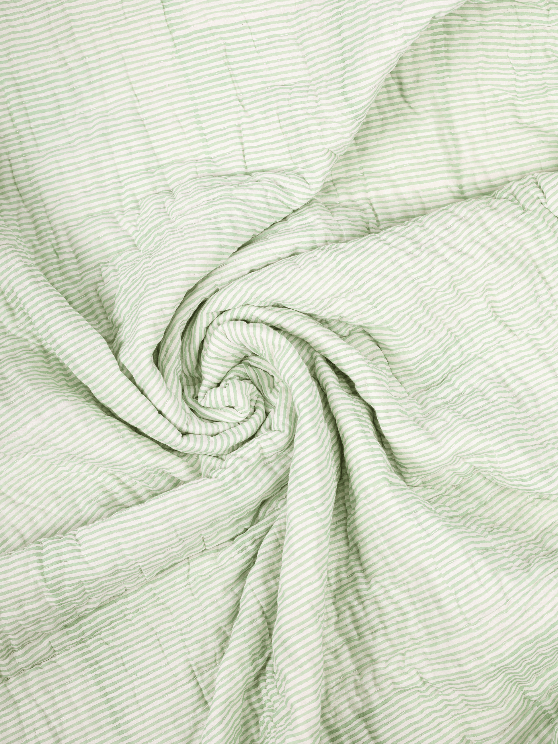 Green and white Jaipuri quilt with cotton filling