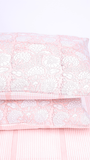 Peach striped double bed bedsheet with reversible pillow covers