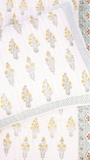 Reversible double bed cover with floral and chevron design