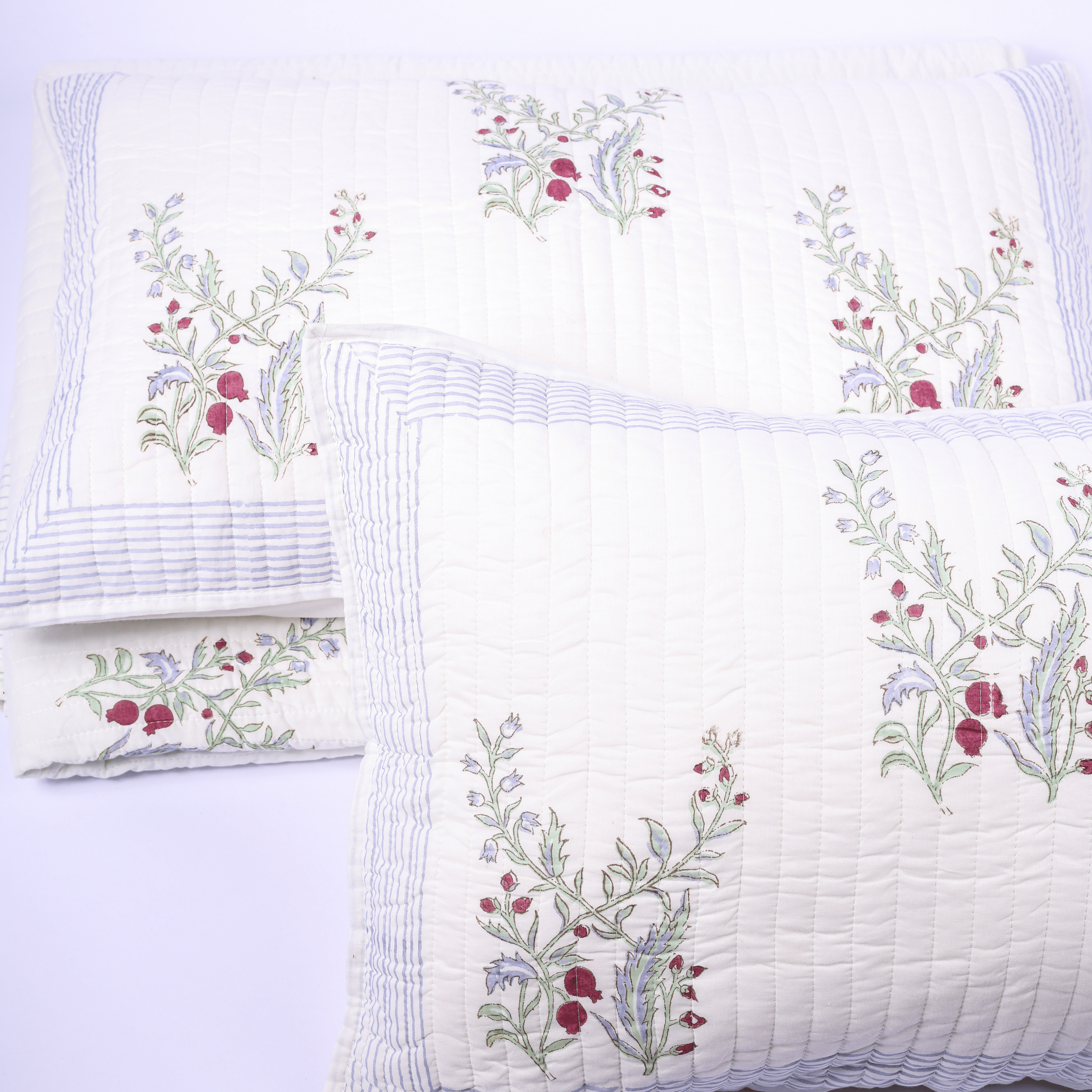White cotton bed cover with hand block printed motifs