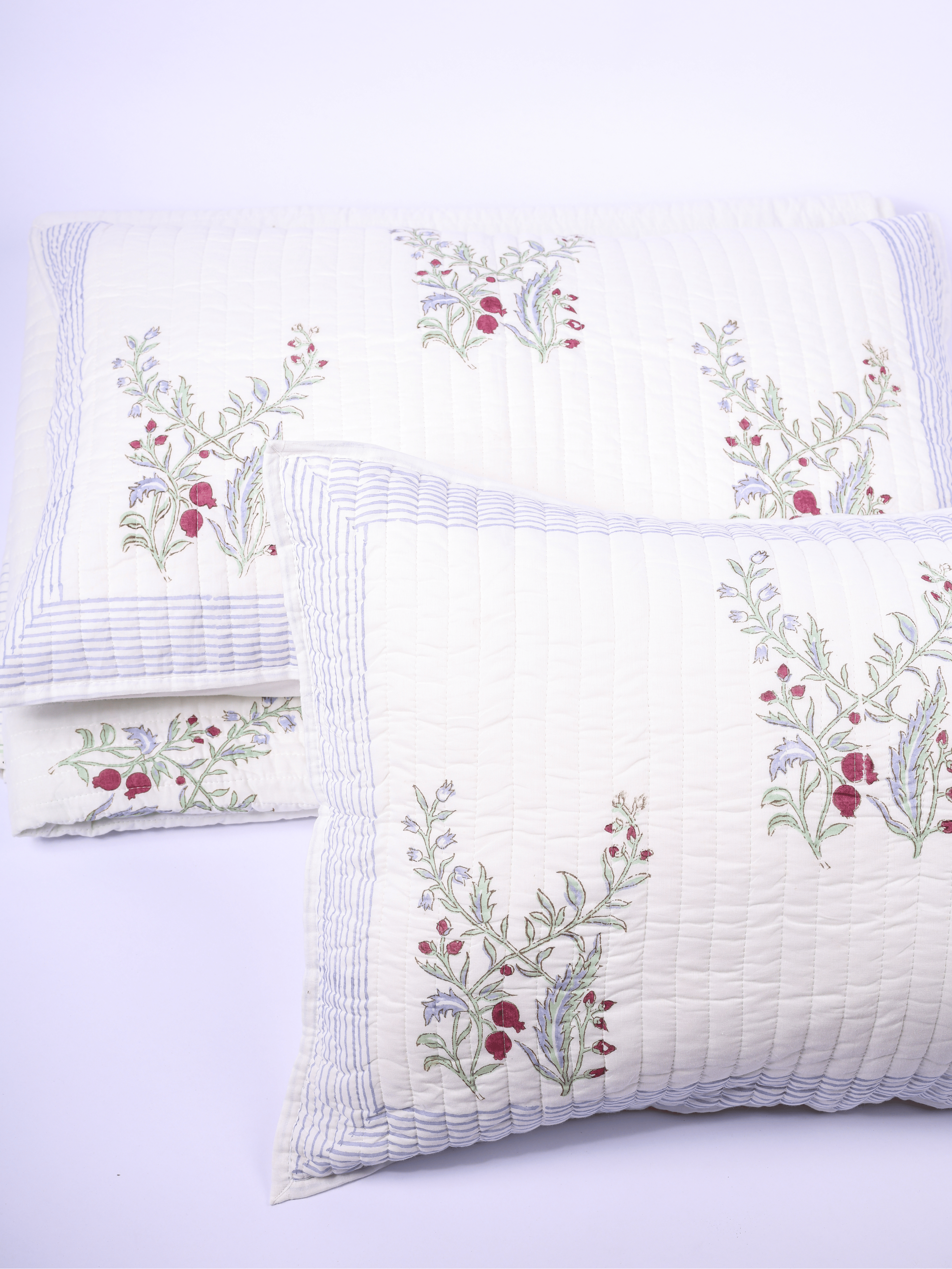 White cotton bed cover with hand block printed motifs
