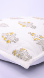 Cotton cushion cover with yellow floral block print
