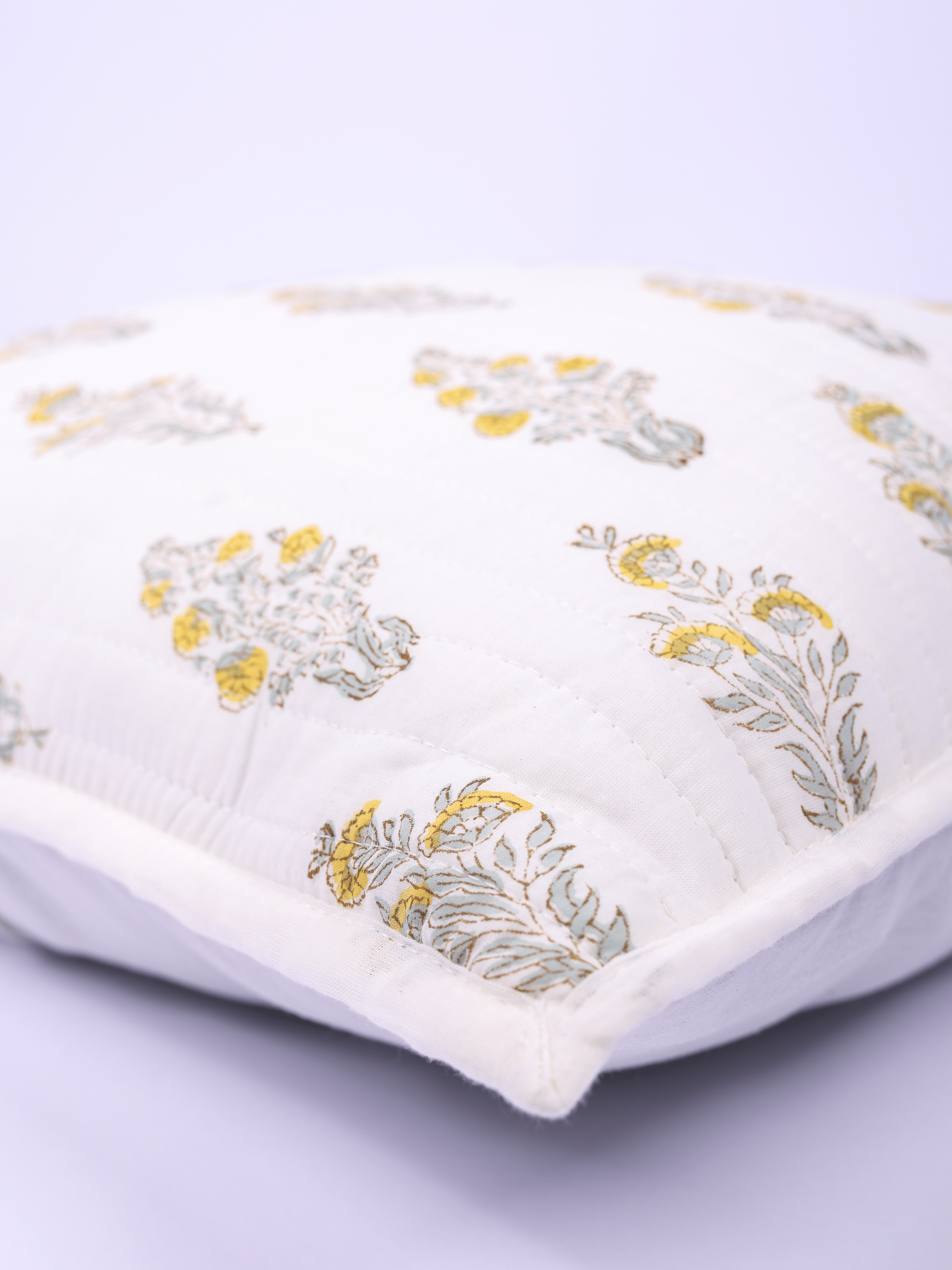 Cotton cushion cover with yellow floral block print