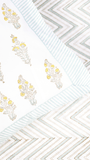 Green printed cotton bedsheet with reversible yellow pillow covers